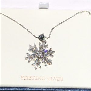 Sterling silver snowflake necklace.